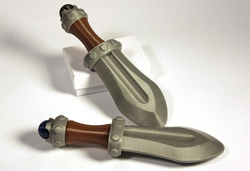 Illustration for article titled Prepare Your Child For Pre-School With a 3D-Printed Baby Rattle Sword